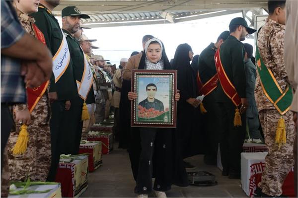 آئین استقبال از پیکرهای مطهر 35 شهید تازه تفحص شده در پایانه مرزی شهید سلیمانی مرز مهران - 5 مهر ماه 1403 4