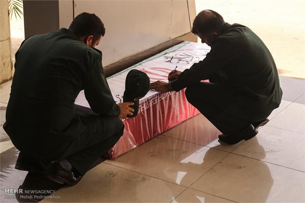 ورود پیکر ۱۸ شهید گمنام دفاع مقدس از طریق فرودگاه اهواز 1