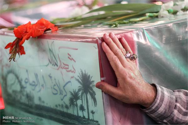 استقبال از ۸ شهید گمنام در فرودگاه بیرجند 10