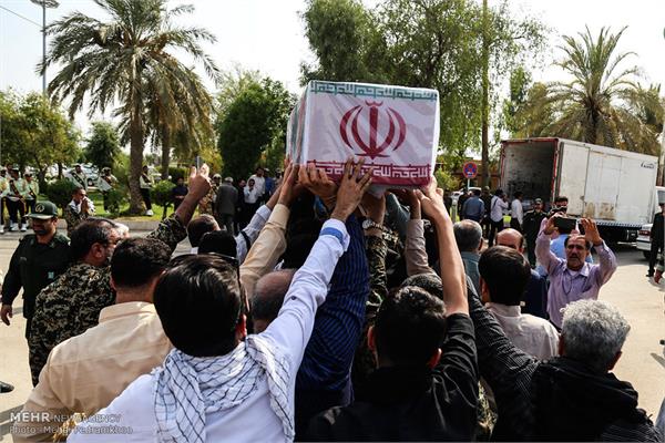 ورود پیکر ۱۸ شهید گمنام دفاع مقدس از طریق فرودگاه اهواز 19