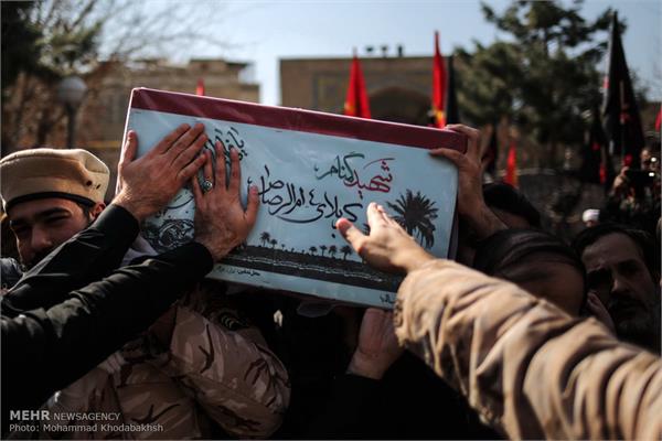 مراسم تشییع و تدفین پیکر دو شهید گمنام در مدرسه علمیه مروی 20