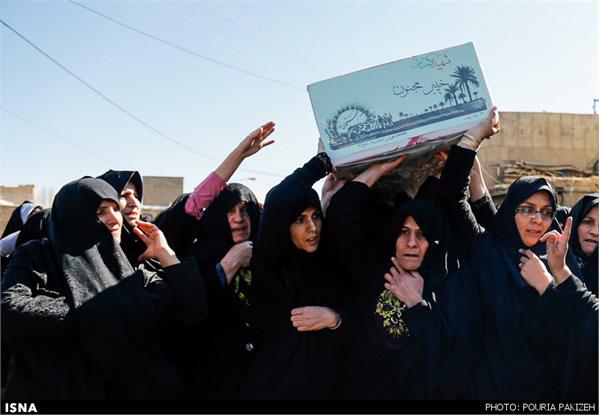 تشییع دو شهید گمنام دوران دفاع مقدس در روستای صالح آباد - همدان