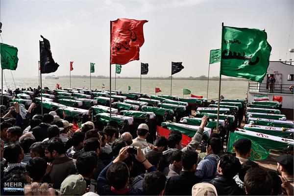 بازگشت پیکرهای ۶۸ شهید دوران دفاع مقدس به کشور 10