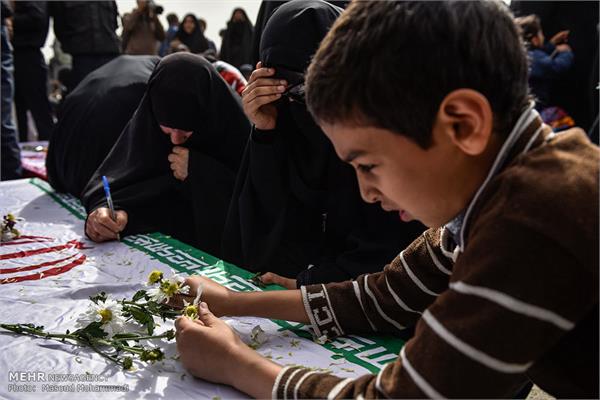 بازگشت پیکرهای ۶۸ شهید دوران دفاع مقدس به کشور 26