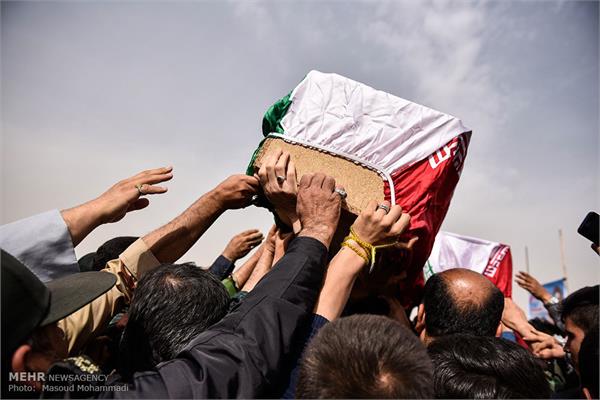 بازگشت پیکرهای ۶۸ شهید دوران دفاع مقدس به کشور 18