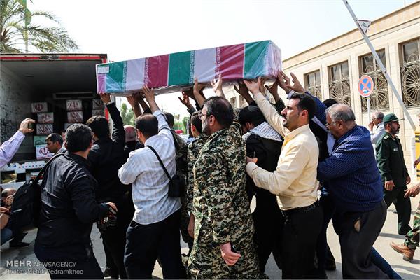ورود پیکر ۱۸ شهید گمنام دفاع مقدس از طریق فرودگاه اهواز 20