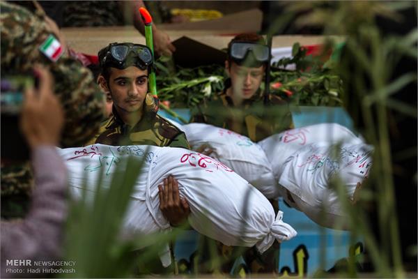 مراسم تشییع پیکر سه شهید گمنام دفاع مقدس در تهران 15