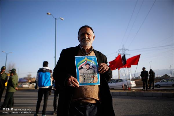 استقبال مردم همدان از پیکر شهید حسین سپهر 4