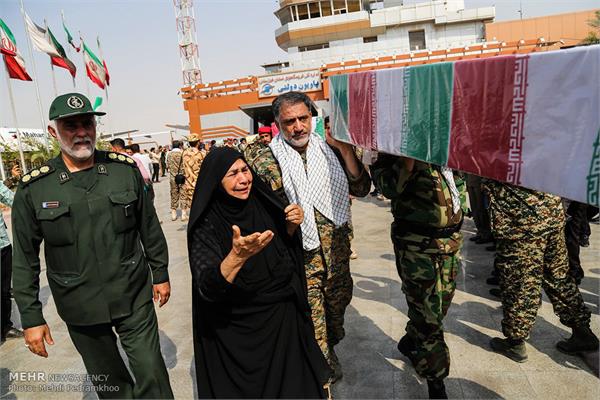 ورود پیکر ۱۸ شهید گمنام دفاع مقدس از طریق فرودگاه اهواز 13