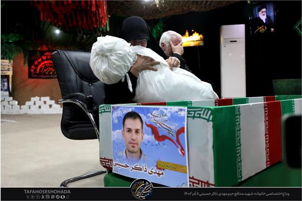 وداع با پیکر مطهر شهید مدافع حرم مهدی ذاکر حسینی 8 آذر 1402 1