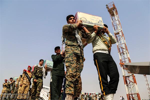 ورود پیکر ۱۸ شهید گمنام دفاع مقدس از طریق فرودگاه اهواز 11