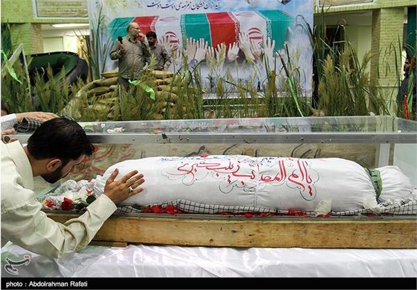 تشییع پیکر شهید غواص امیر مسعود محمدزاده در استان همدان 13