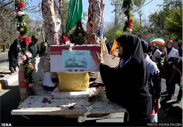 تشییع و خاکسپاری دو شهید گمنام در استان همدان 9