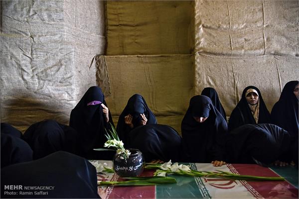 ورود پیکر ۱۸ شهید گمنام دفاع مقدس از طریق فرودگاه اهواز 4