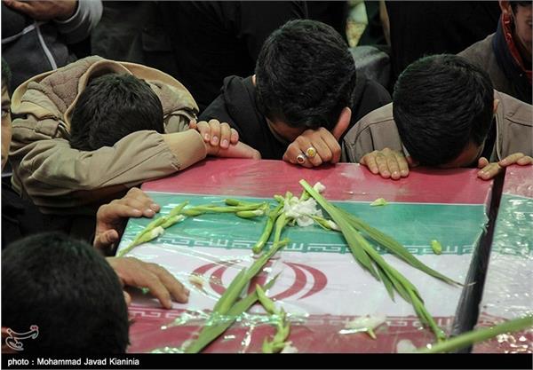 مراسم تشییع و تدفین پیکر شهدای گمنام در کرمان 14