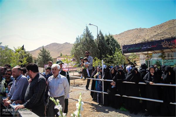 تشییع پیکر شهید گمنام در دهکده مقاومت تهران 18