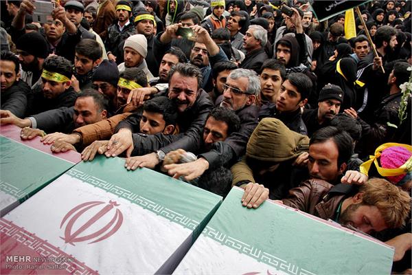 تشییع پیکر یازده شهید دفاع مقدس در مشهد 12