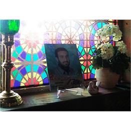 قاب عکس های شهدای تفحص در پنجره های معراج شهدای اهواز