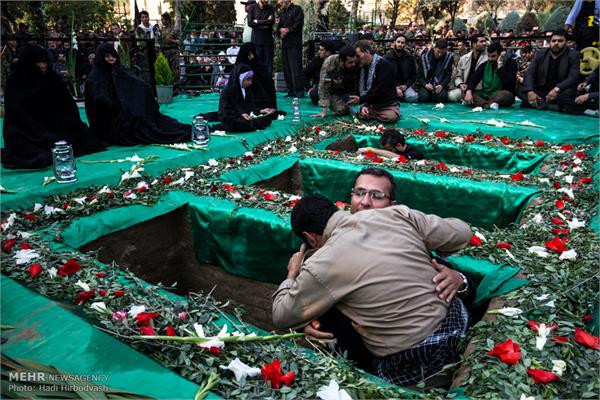 مراسم تشییع پیکر سه شهید گمنام دفاع مقدس در تهران 9