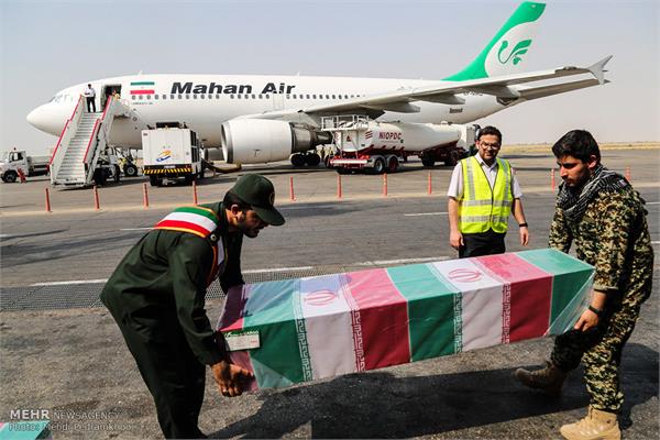 ورود پیکر ۱۸ شهید گمنام دفاع مقدس از طریق فرودگاه اهواز 4