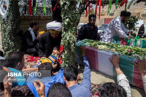 استقبال از دو شهید گمنام دفاع مقدس در شهر ندوشن - یزد 4