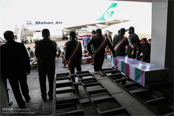 ورود پیکر ۱۸ شهید گمنام دفاع مقدس از طریق فرودگاه اهواز 7