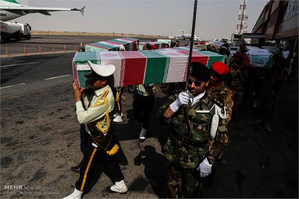 ورود پیکر ۱۸ شهید گمنام دفاع مقدس از طریق فرودگاه اهواز 8