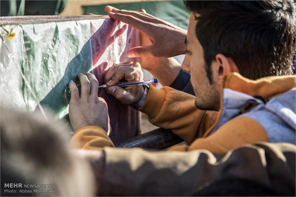 تشییع پیکر شهدای گمنام هشت سال دفاع مقدس در لامرد 5